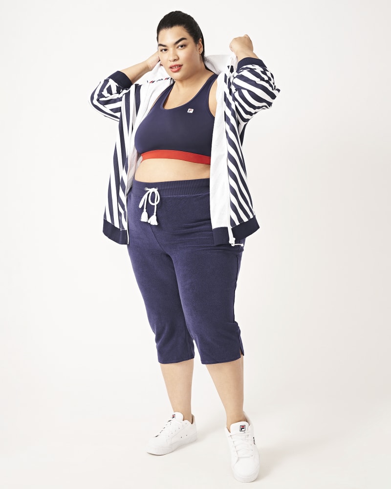 Plus size model with hourglass body shape wearing Donna Striped Bomber Jacket by FILA | Dia&Co | dia_product_style_image_id:160829